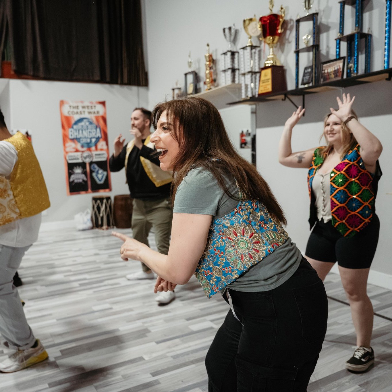 Bollywood Dance Experience Dancers laughing as they learn the choreography
