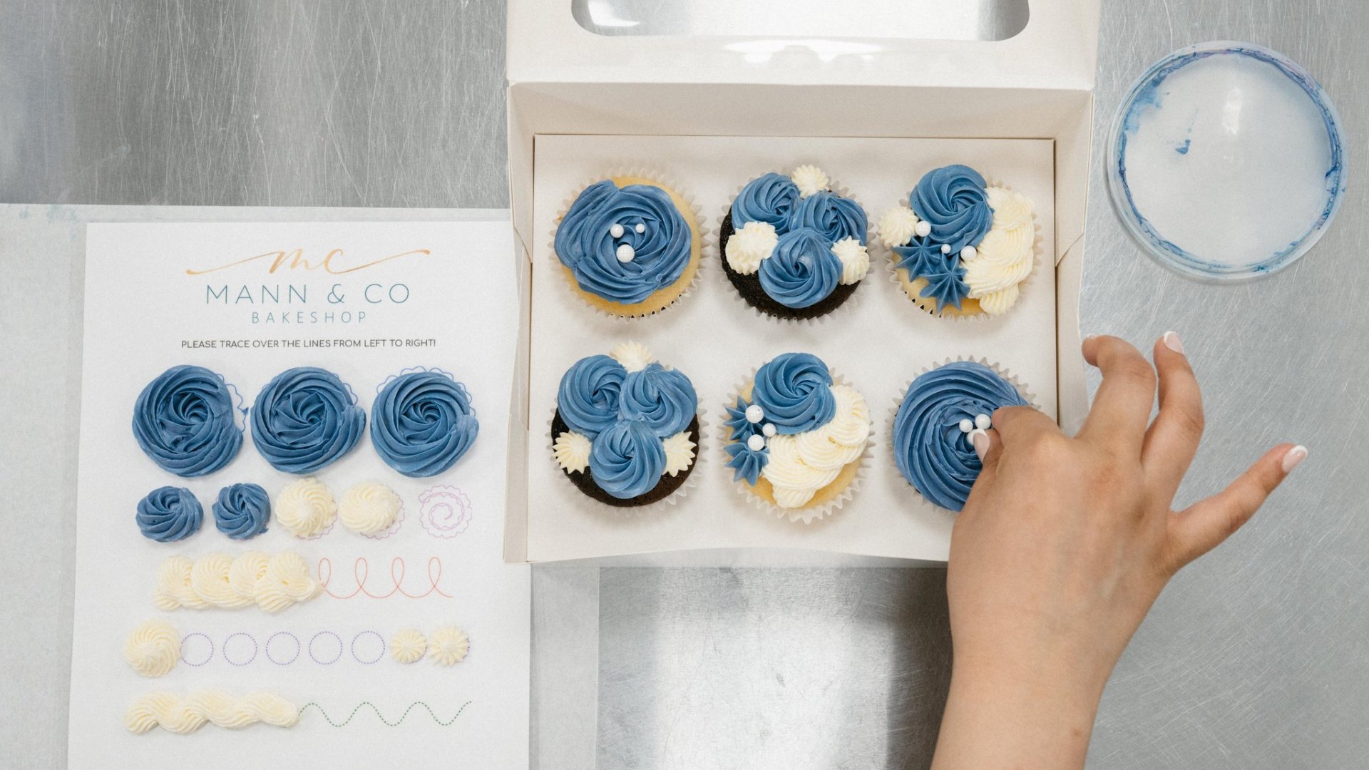 Cupcake Decorating with Jujhar Netflix Champion An overhead view of the finished cupcakes decorated by a guest in this Surrey Signature Experience